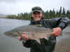 URL 09.07 Day 4.Ian with his own salmon.jpg (105850 bytes)