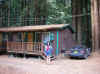 09.26.Redwoods Park.Lindy by our cabin.jpg (170020 bytes)