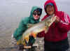 0713.Lindy and Jimmy with nice trout.jpg (67876 bytes)